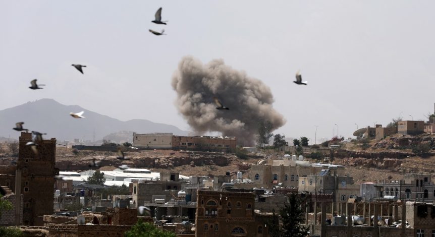 Dust rises from the site of a Saudi-led air strike in Sanaa. REUTERS/Khaled Abdullah
